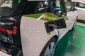 Charging BMW i3. An electric car, automobile that is propelled electric motor