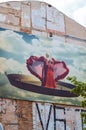 Valencia, Spain-OCTOBER 11, 2018: a LARGE POSTER on the wall of an old house in the Carmen quarter, an image of a woman in a red