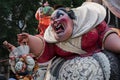 The cartoon figurine of a dominant screaming woman for the national festival Fallas is displaying current affairs in a satirical