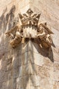 Valencian coat of arms worn by two angels on the facade of the Silk Exchange La Lonja de la Seda Royalty Free Stock Photo