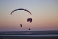 Arges Romania April 5, 2022: evening training of some skydiving enthusiasts at sunset