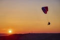 Arges Romania April 5, 2022: evening training of some skydiving enthusiasts at sunset