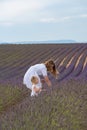 Mother with daughter in lavender field