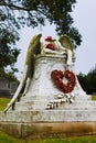 Weeping Angel Monument Colma, California decorated for Valentine's Day with big red heart wreath