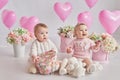 Valentine Baby boy and girl. Valentine`s Day. Balls and flowers. Celebration. Mother`s day postcard. International day of