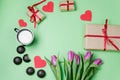 Valentine background with gift box, sweet, hearts and tulips on Royalty Free Stock Photo