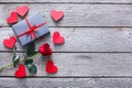 Valentine background, handmade hearts, rose and gift on wood Royalty Free Stock Photo