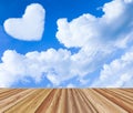 Valentine background. Wooden board table top over blue sky with Royalty Free Stock Photo