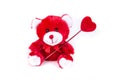 Valentine bear holding a heart on a stick