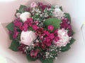 Valentine, Beautiful pink bouquet with peonies flowers, blossoms from above wraped in pink paper