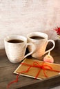 Valentine greeting card with two cups on wooden tray Royalty Free Stock Photo