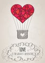 Valentine card with a heart-shaped hot air balloon and a love slogan