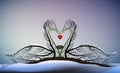 Valentine card love forever, Two swans look like tree branches with the bird nest inside and holding the heart, Royalty Free Stock Photo