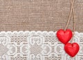 Valentine card with wooden hearts and lacy cloth Royalty Free Stock Photo