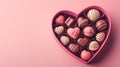 Dessert for Valentine's Day. Homemade heart shaped chocolate candies in pink heart shaped box. Top view with copy Royalty Free Stock Photo
