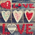 valentine collage with love symbols on wooden background in vintage style Royalty Free Stock Photo