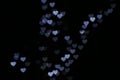 Valentine Colorful heart-shaped white on black background lighting bokeh for decoration at night backdrop wallpaper blurred valent