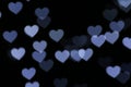 Valentine Colorful heart-shaped white on black background lighting bokeh for decoration at night backdrop wallpaper blurred valent