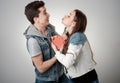 Valentine Couple. Portrait of Smiling Beauty Girl and her Handsome Boyfriend.