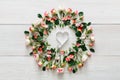 Valentine day background, heart card and flowers on white wood Royalty Free Stock Photo