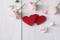 Valentine day background, hearts and flowers on white wood Royalty Free Stock Photo