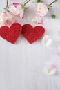 Valentine day background, hearts and flowers on white wood Royalty Free Stock Photo