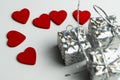 Valentine day background with hearts and present, top view