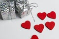 Valentine day background with hearts and present, top view