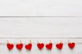 Valentine day background, paper hearts border on wood, copy space Royalty Free Stock Photo