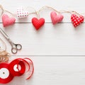 Valentine day background, pillow hearts border on wood, copy space Royalty Free Stock Photo