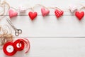 Valentine day background, pillow hearts border on wood, copy space Royalty Free Stock Photo