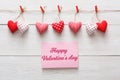 Valentine day background, pillow hearts border on wood, copy space Royalty Free Stock Photo