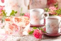 Valentine day background, two cups, pink roses, gift box Royalty Free Stock Photo