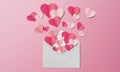 Valentine day composition with envelope and pink paper hearts Royalty Free Stock Photo