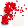 Valentine day composition:many gift boxes with red bows and a notebook on a white background with hearts. Top View.View from above