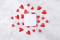 Valentine day composition with paper card and various red hearts for love romantic message. Flat lay Royalty Free Stock Photo