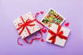 Valentine day composition: sweet candy, with gift boxes with bow and red felt hearts, photo template, background. Top Royalty Free Stock Photo