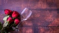 Valentine Day.  Glass wine and red rose on old wood background. Royalty Free Stock Photo