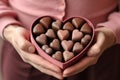 hands holding different chocolates in a box . AI Generated Royalty Free Stock Photo
