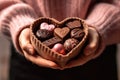 hands holding different chocolates in a box . AI Generated Royalty Free Stock Photo