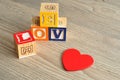 Valentine Day.Love Spelled with colorful alphabet blocks and a Royalty Free Stock Photo