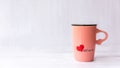 Valentine Day with pink cup coffee red heart on the cup, Royalty Free Stock Photo