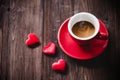 Valentine Day with red cup coffee Sewed pillow hearts row border, old wood background Royalty Free Stock Photo