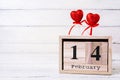Valentine day. Wooden calendar with February 14 on it