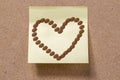 valentine drawn with coffee beans on memory note Royalty Free Stock Photo