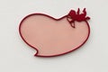 Valentine frame in shape of heart with Cupid