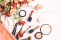 Valentine Gift. Makeup cosmetics tools background and beauty cosmetics, products and facial cosmetics package with flower rose Royalty Free Stock Photo