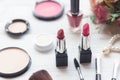 Valentine Gift. Makeup cosmetics tools background and beauty cosmetics, products and facial cosmetics package lipstick, eye shadow Royalty Free Stock Photo