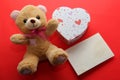 Valentine gifts letters, flowers and chocolates with hearts on red background