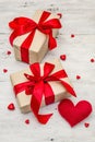 Valentine greeting card background with gift boxes, red ribbons and assorted hearts Royalty Free Stock Photo